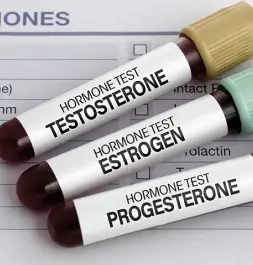 Blood sample tubes labeled for hormone testing.