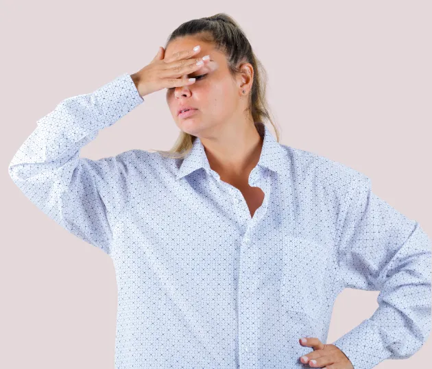 A woman with brain fog, symbolizing the internal symptoms of hormonal imbalance and emotional wellness needs.